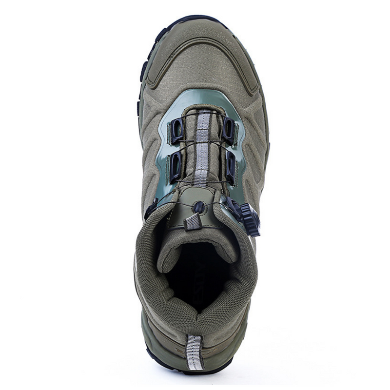 Grüner Wanderschuh mit Schnellschnürsystem, robustes Design, ideal für Outdoor-Aktivitäten.