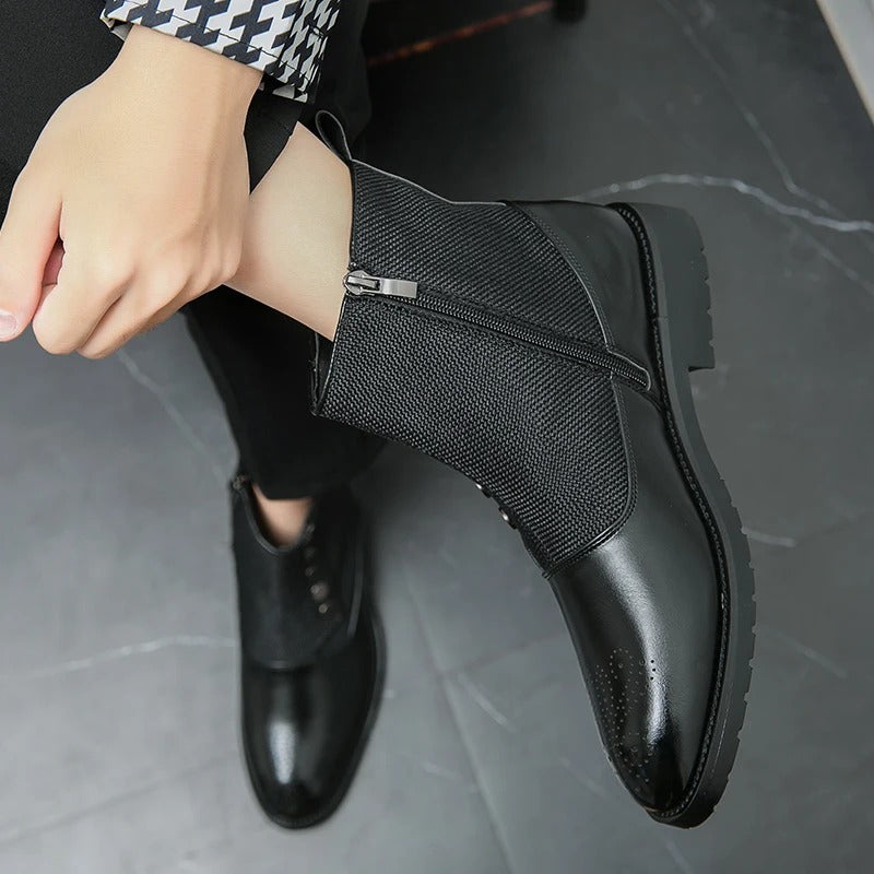 Schwarze Herrenstiefeletten aus Leder mit Reißverschluss, elegantes Design, rutschfeste Sohle.