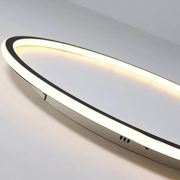 Moderne LED-Deckenleuchte, oval, schwarz-weiß, energiesparend, für Wohnzimmerbeleuchtung.