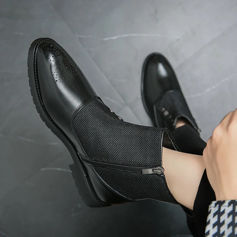 Schwarze Herrenstiefel aus Leder mit Reißverschluss, elegantes Design, rutschfeste Sohle.