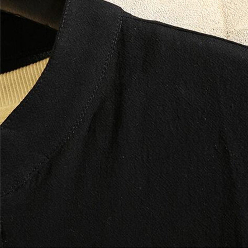 Schwarze Jacke aus Baumwolle, Nahaufnahme, Textur, Mode, Oberbekleidung, Detailansicht.