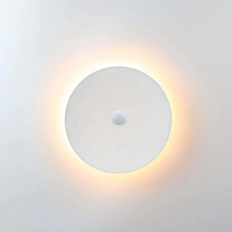 Runde LED-Wandleuchte, weiß, warmweißes Licht, modernes Design, energiesparend.