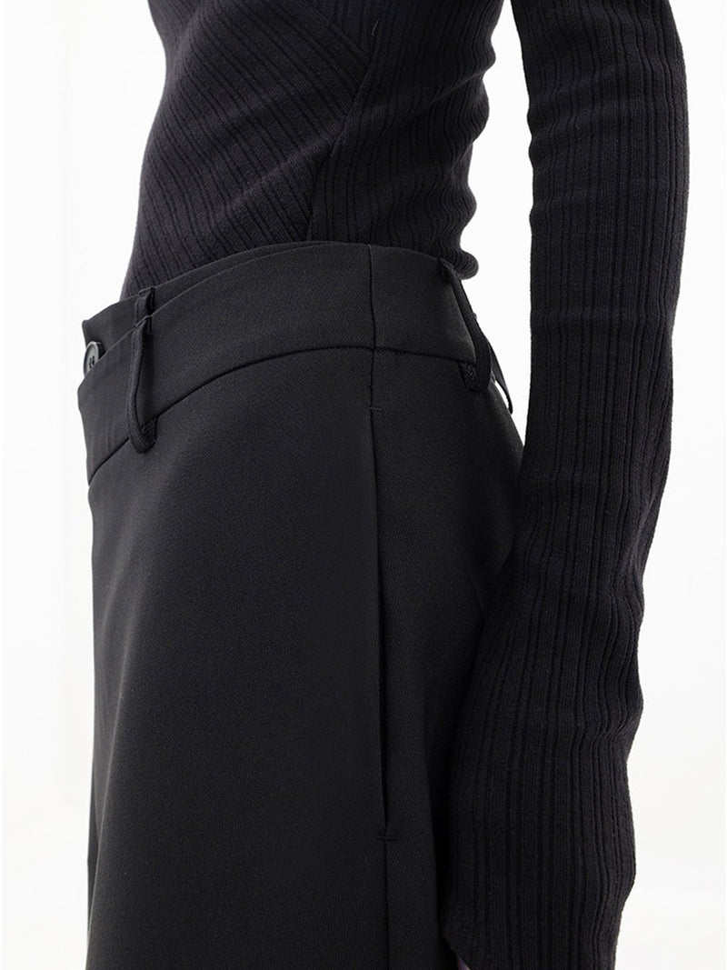 Schwarze asymmetrische Baggy-Hose, Damenmode, elegantes Design, bequemer Stoff.