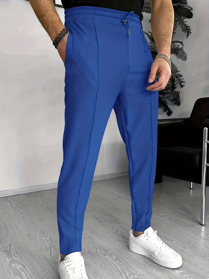 Blaue Herren-Chinohose, kariert, modern, aus Baumwolle, ideal für Freizeit und Büro.