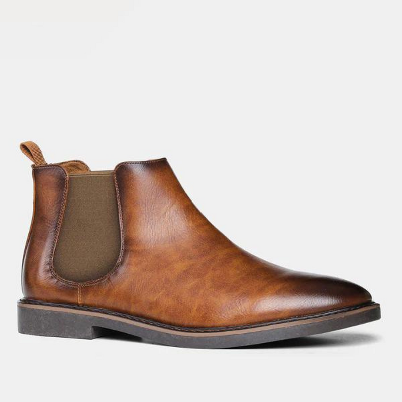 Brauner Chelsea Boot aus Leder, Herrenmode, eleganter Schuh, rutschfeste Sohle, zeitloses Design.