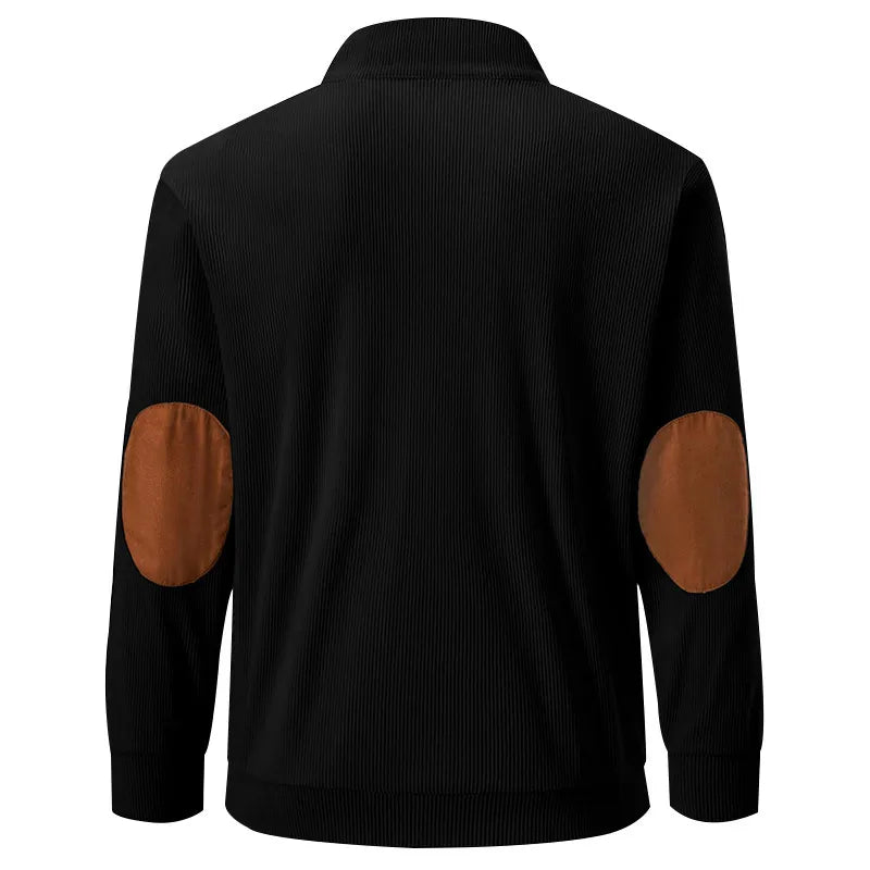 Schwarze Cordjacke mit braunen Ellbogen-Patches, Herrenmode, stilvoll, lässig.