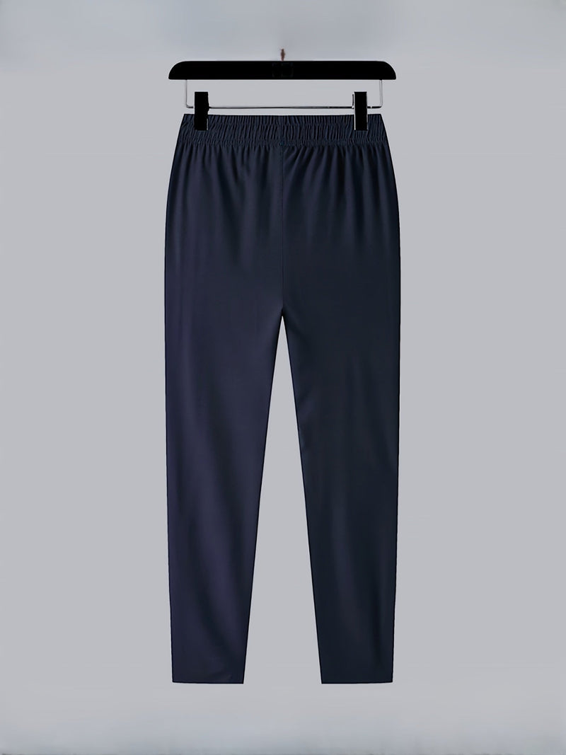 Dunkelblaue Jogginghose aus Baumwolle, elastischer Bund, bequeme Sportbekleidung für Herren.