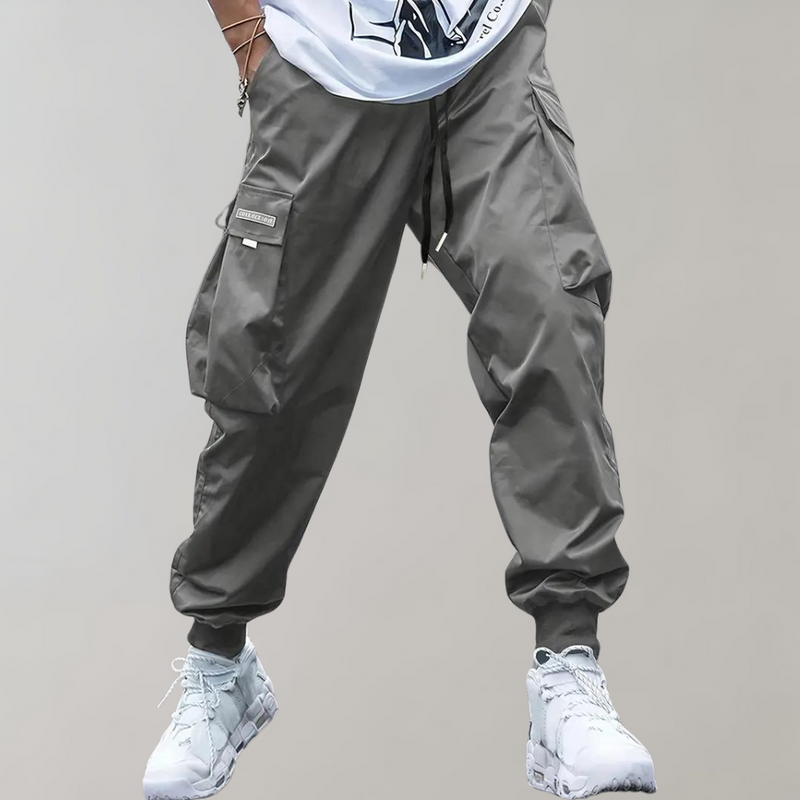 Graue Cargohose für Herren, lässig, mit Taschen, ideal für Streetwear und Freizeitmode.