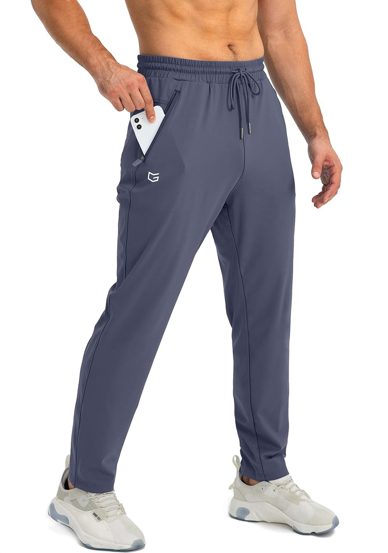 Graue Herren-Sporthose mit Smartphone-Tasche, elastischer Bund, ideal für Fitness und Freizeit.