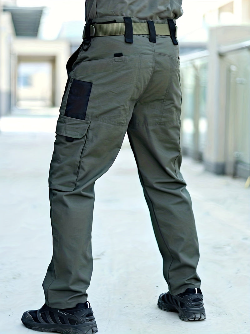 Grüne taktische Hose mit Seitentasche, Outdoor-Design, robuste Materialien, Herrenmode.
