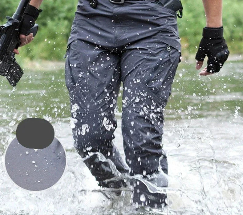 Graue taktische Herren-Cargohose, wasserdicht, verschleißfest, mit mehreren Taschen.
