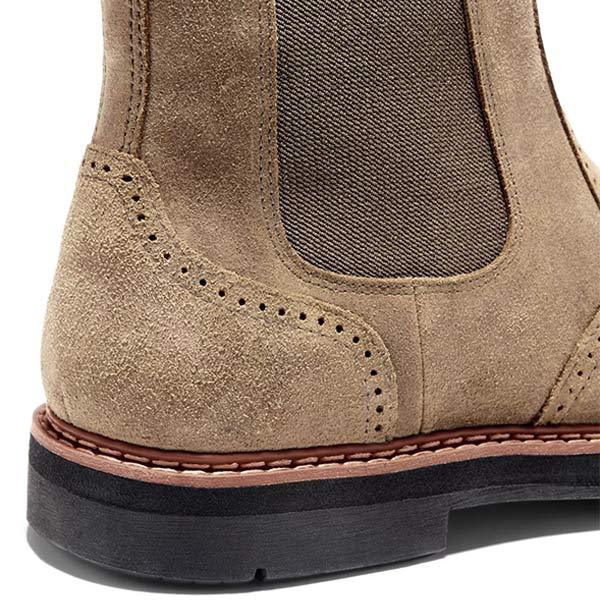 Beiger Wildleder-Chelsea-Boot mit schwarzer Sohle, elegantes Design, Herrenmode.