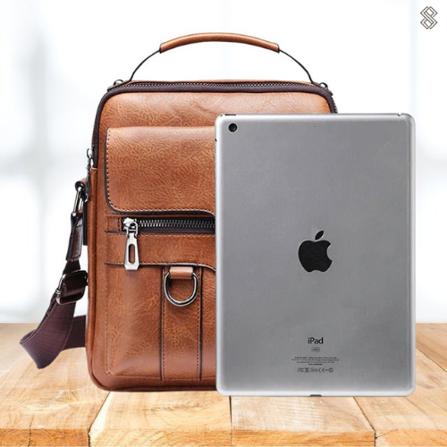 Braune Ledertasche mit Schulterriemen, iPad-Hülle, stilvolles Design, hochwertige Verarbeitung.