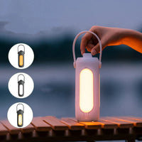Tragbare LED-Laterne, dimmbar, weiß, für Camping und Outdoor, mit Griff, modernes Design.