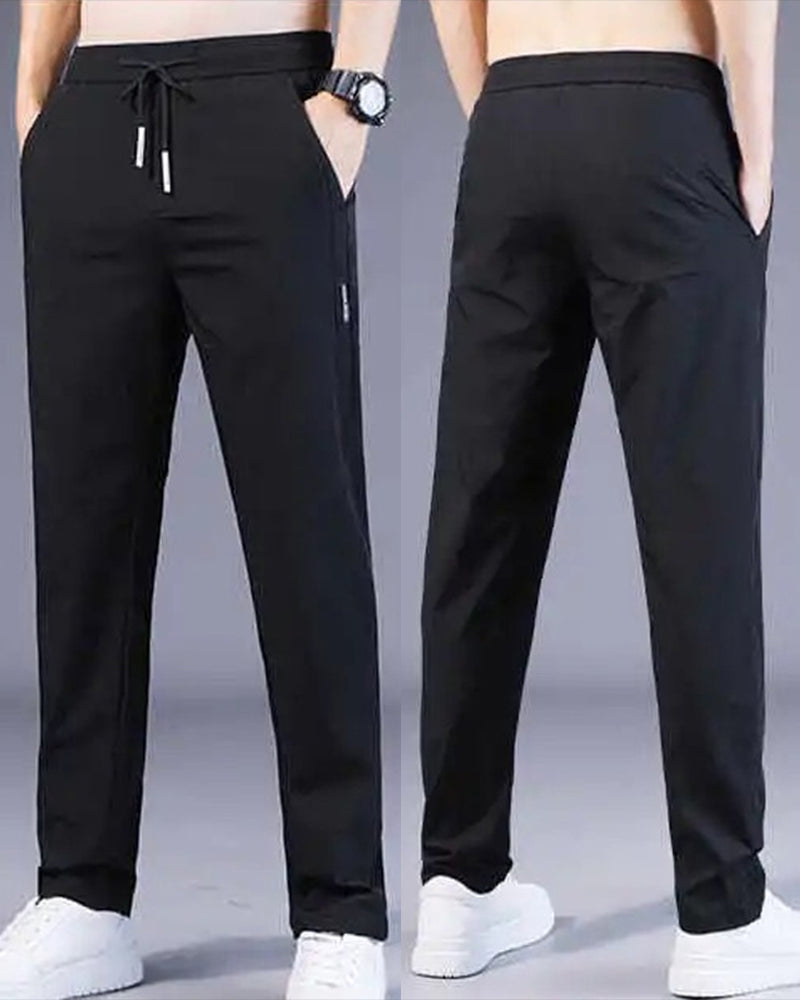 Schwarze Herren-Sporthose, elastisch, atmungsaktiv, mit Taschen, ideal für Fitness und Freizeit.