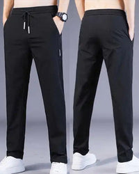 Schwarze Herren-Sporthose, elastisch, atmungsaktiv, mit Taschen, ideal für Fitness und Freizeit.
