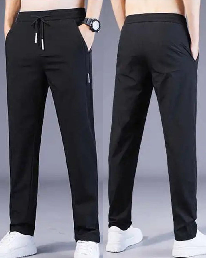 Schwarze Herren-Sporthose, elastisch, atmungsaktiv, mit Taschen, ideal für Fitness und Freizeit.