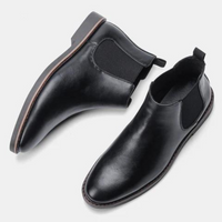 Schwarze Chelsea Boots aus Leder, elegante Herrenschuhe, rutschfeste Sohle, modisch und bequem.