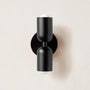 Schwarze Wandleuchte, modernes Design, zylindrische Form, doppelseitig, Innenbeleuchtung.