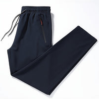 Dunkelblaue Jogginghose mit Kordelzug, Reißverschlusstasche, Sportbekleidung Herren.