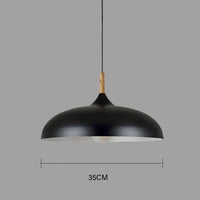 Schwarze Pendelleuchte, Metall, 35 cm Durchmesser, modernes Design, Holzdetail, Innenbeleuchtung.