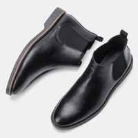 Schwarze Chelsea Boots aus Leder, Herrenmode, elegante Schuhe, rutschfeste Sohle, stilvoll.