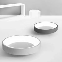 Moderne runde Waschbecken aus Keramik, weiß und grau, minimalistisches Badezimmerdesign.