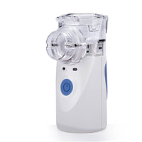 Tragbarer weißer Inhalator mit blauem Knopf, kompakt, für Atemwegstherapie, medizinisches Gerät.
