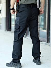 Schwarze taktische Hose für Herren, robust, mit Seitentaschen, ideal für Outdoor-Aktivitäten.