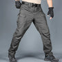 Taktische graue Cargohose für Herren, robustes Material, ideal für Outdoor-Aktivitäten.