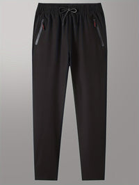 Schwarze Jogginghose mit Kordelzug, Reißverschlusstaschen, bequem, sportlich, Herrenmode.