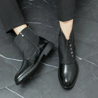 Schwarze Herrenstiefel aus Leder mit Reißverschluss und Knöpfen, elegantes Design, rutschfeste Sohle.