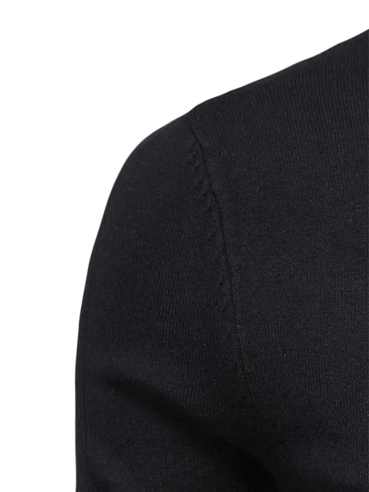 Schwarzer Baumwollpullover, Nahaufnahme, weiches Material, modisch, bequem, hochwertig.