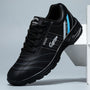 Schwarzer Sneaker aus Leder mit blauen Streifen, sportliches Design, Herrenmode, bequeme Schuhe.