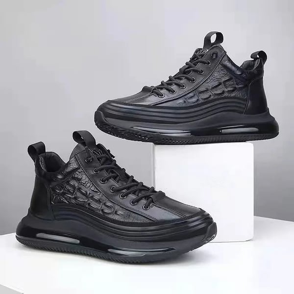 Schwarze Air-Cushion-Sneaker, Lederoptik, rutschfeste Sohle, modische Herrenschuhe.
