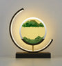 Moderne Sanduhrlampe mit LED, runder Rahmen, grünem Sand, dekorative Tischleuchte.