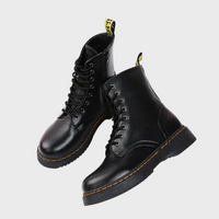 Schwarze Lederstiefel mit Schnürung, robuste Sohle, modisch, Unisex, klassisches Design.