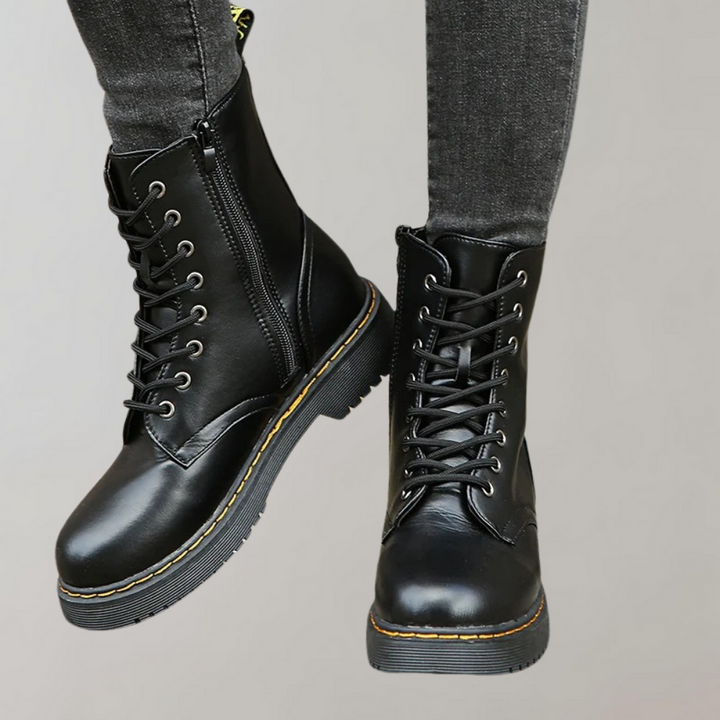 Schwarze Lederstiefel mit Schnürung, Reißverschluss, gelber Naht, Damenmode, Herbst/Winter.