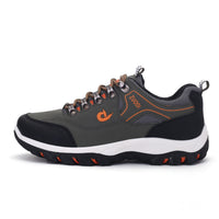 Grauer orthopädischer Sneaker, atmungsaktiv, mit orangefarbenen Akzenten, für Herren.