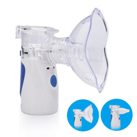 Tragbarer weißer Inhalator mit blauem Knopf, ideal für Asthma und Atemwegserkrankungen.
