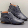 Wasserdichte schwarze Leder-Stiefeletten, flach, mit Nahtdetails, ideal für Herbstmode.