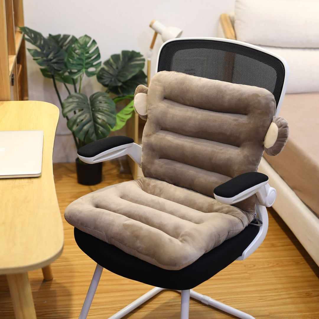 Ergonomischer Bürostuhl mit beigem, gepolstertem Sitzkissen, ideal für komfortables Arbeiten.