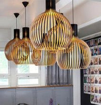 Moderne schwarze Pendelleuchte aus Metall, kugelförmig, für Esszimmer oder Küche.
