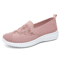 Rosa Damen-Sneaker aus Mesh mit Blumenstickerei, atmungsaktiv und bequem.