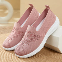 Rosa Damen-Sneaker aus Mesh mit Blumenstickerei, atmungsaktiv und bequem.