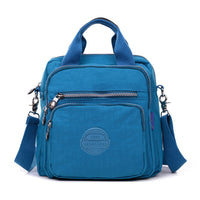 Blaue multifunktionale Umhängetasche, Reißverschlüsse, verstellbarer Gurt, Freizeit, Unisex.