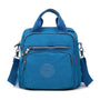 Blaue multifunktionale Umhängetasche, Reißverschlüsse, verstellbarer Gurt, Freizeit, Unisex.