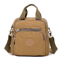 Beige multifunktionale Umhängetasche, Nylon, Reißverschlüsse, verstellbarer Gurt, lässiges Design.
