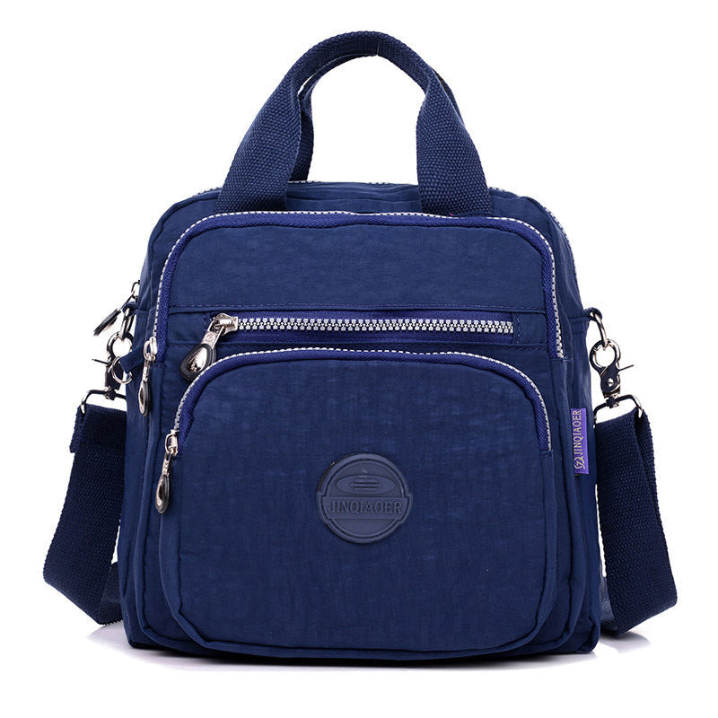 Blaue multifunktionale Umhängetasche, Reißverschlüsse, Nylon, lässig, Unisex, kompakt.