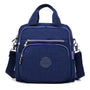 Blaue multifunktionale Umhängetasche, Reißverschlüsse, Nylon, lässig, Unisex, kompakt.